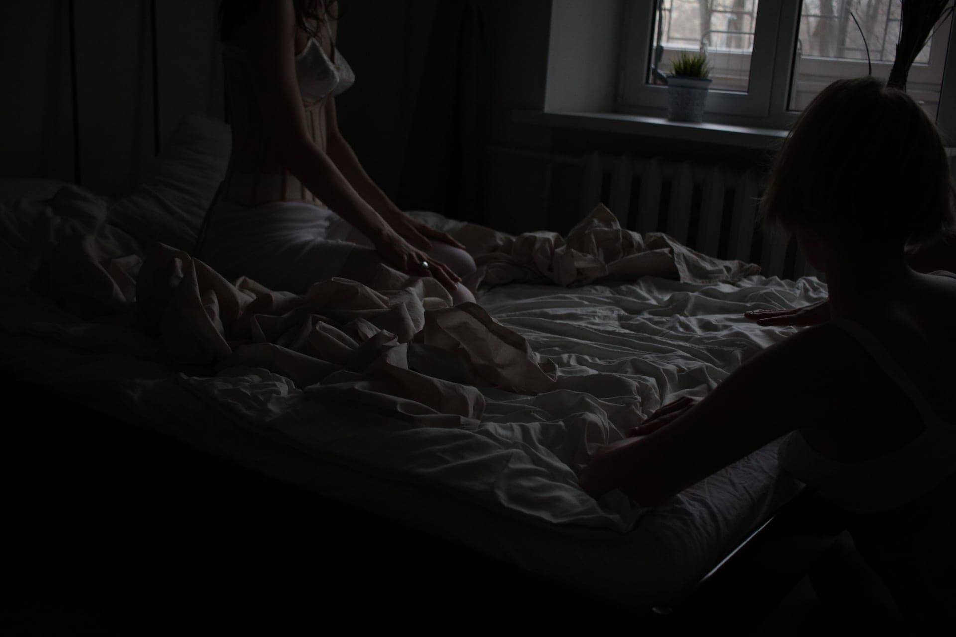 A dim bedroom interior at night